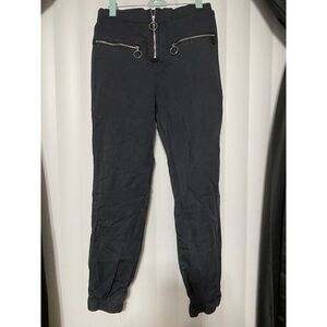 Black zippered style pants